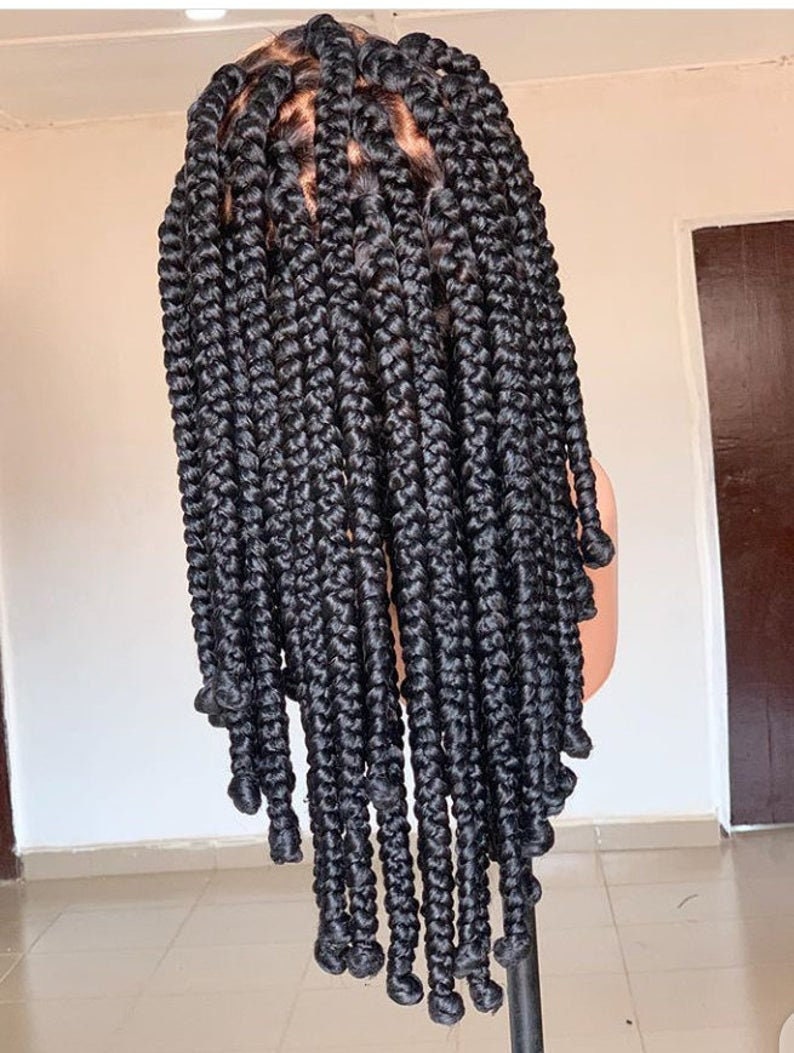Back view of jumbo box braided wig full length natural look