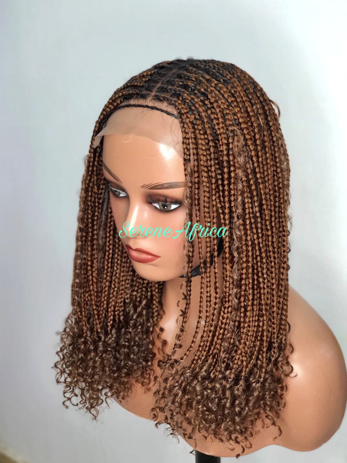 Side view knotless boho box braid wig on mannequin head ready to wear braided wig natural look