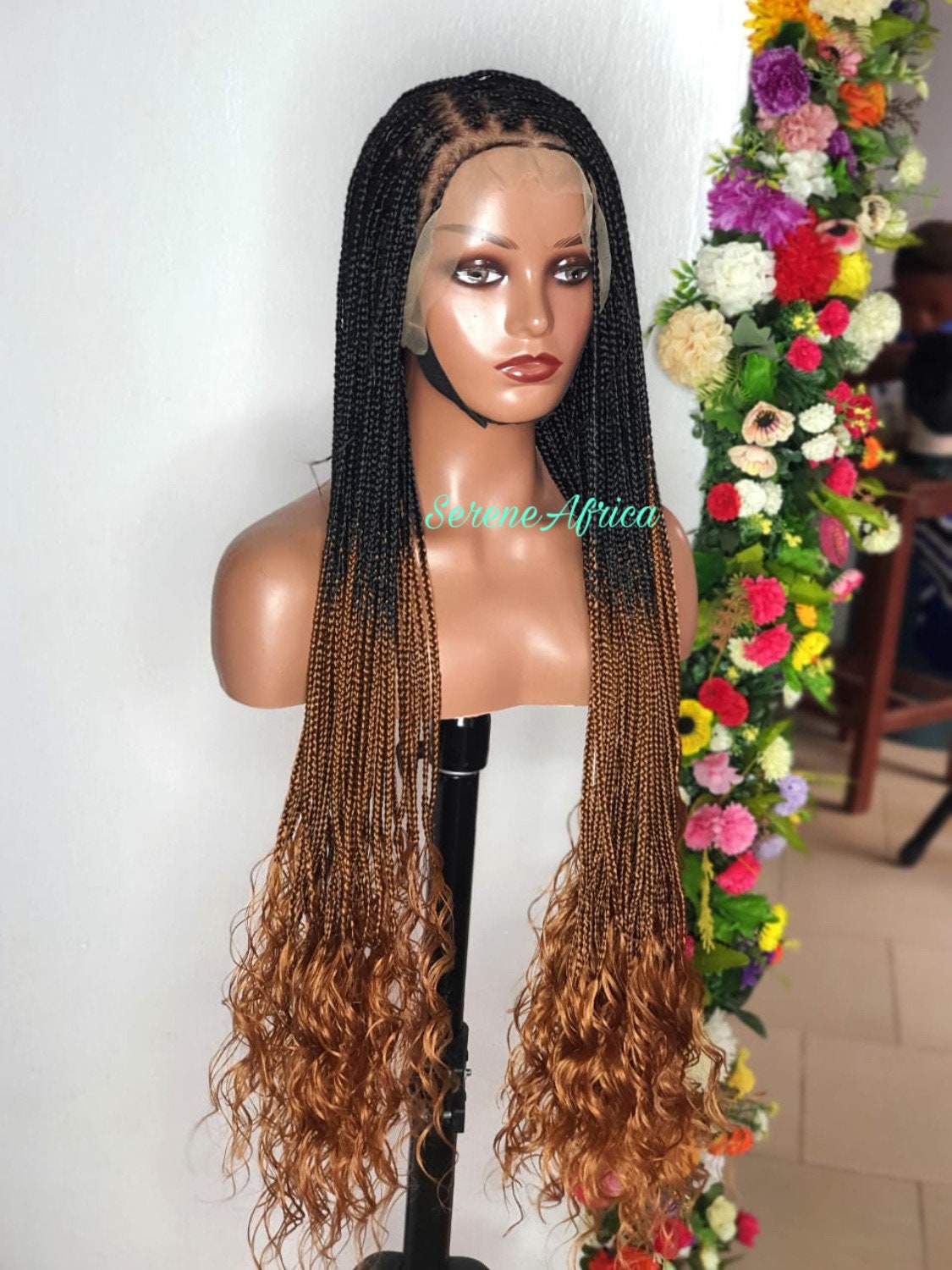Side view black and brown ombre knotless braid wig with curls on mannequin head natural braided wig