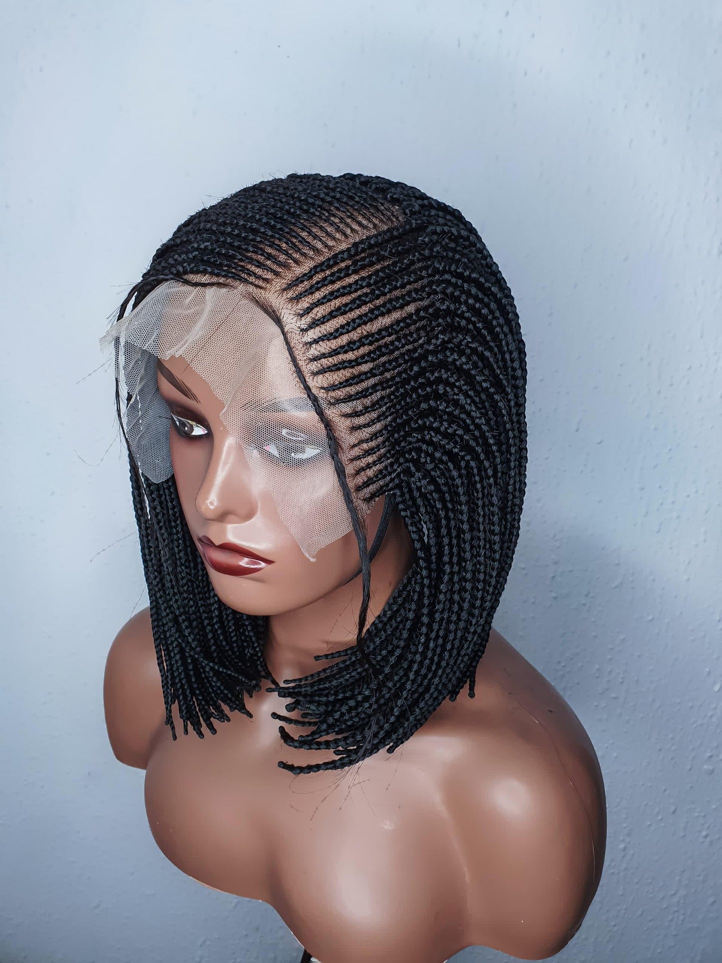 Side view short bob box braid wig on mannequin head neat natural braided wig
