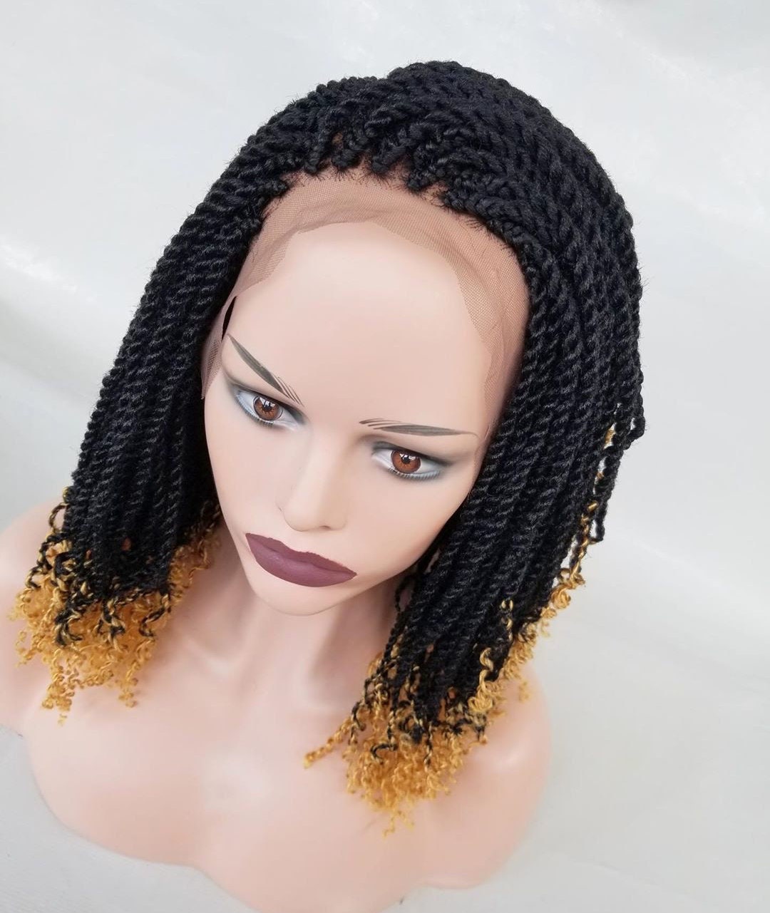 Short kinky twist braid wig on mannequin head natural lightweight braided wig