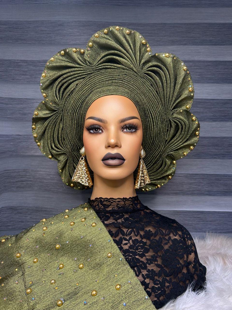Premium green embellishdasooke auto gele pre tied ready to wear nigerian bridal statement headwrap for traditional wedding on a mannequine
