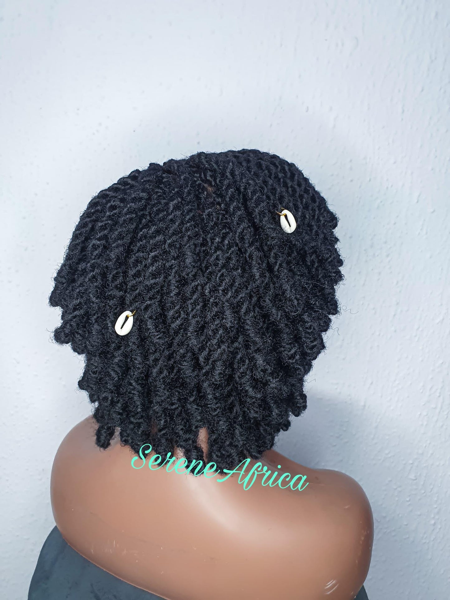 Back view of short Senegalese twist braided wig full natural look