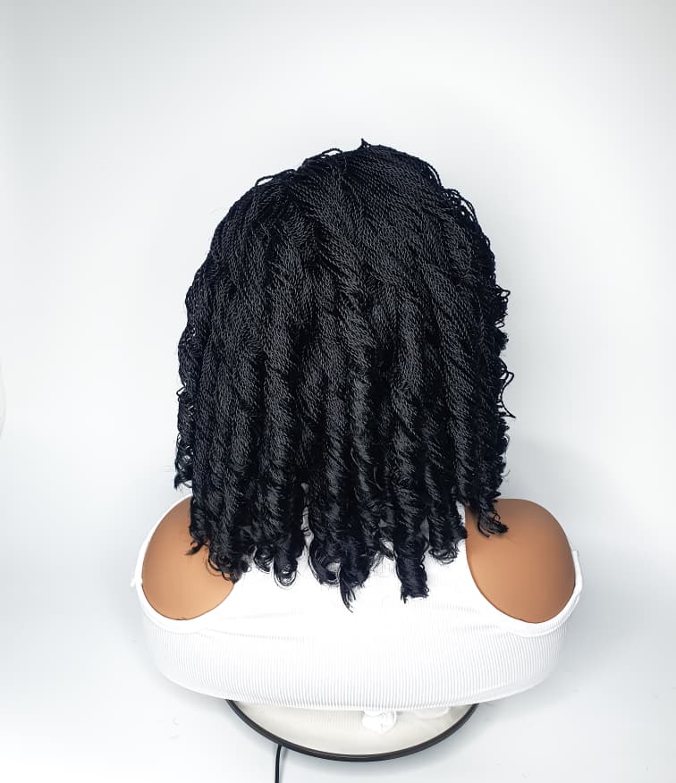 Jet black shoulder-length twist wig with curls and lace closure, back view