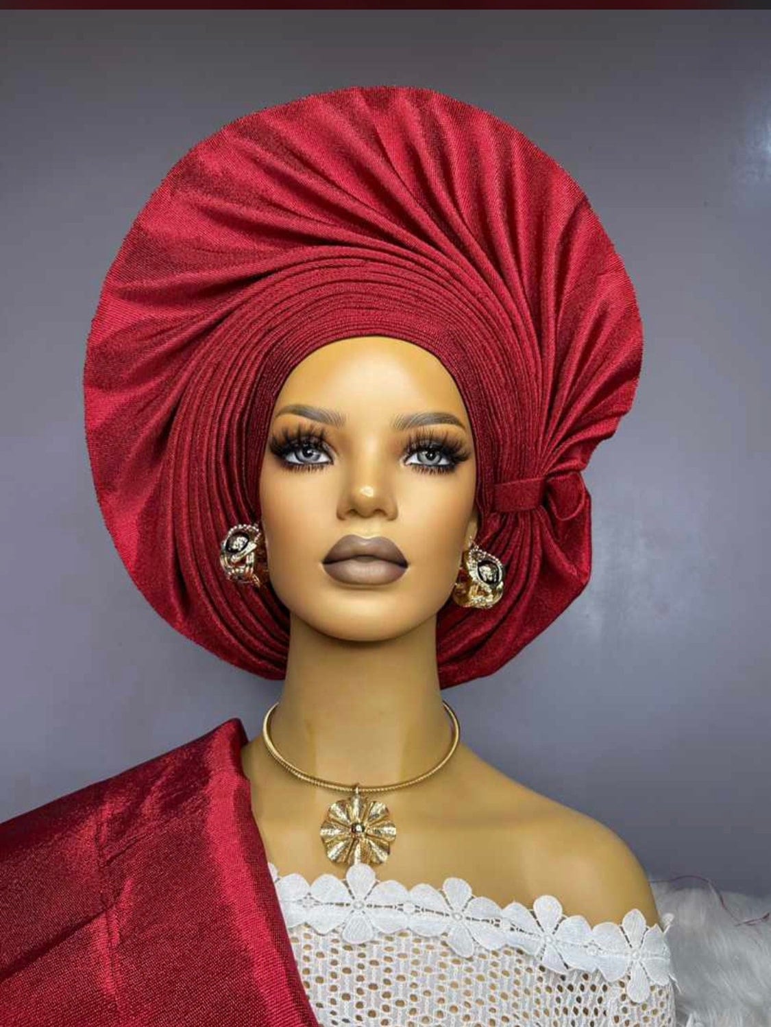 Bridal wine red autogele styled for traditional Nigerian ceremonies