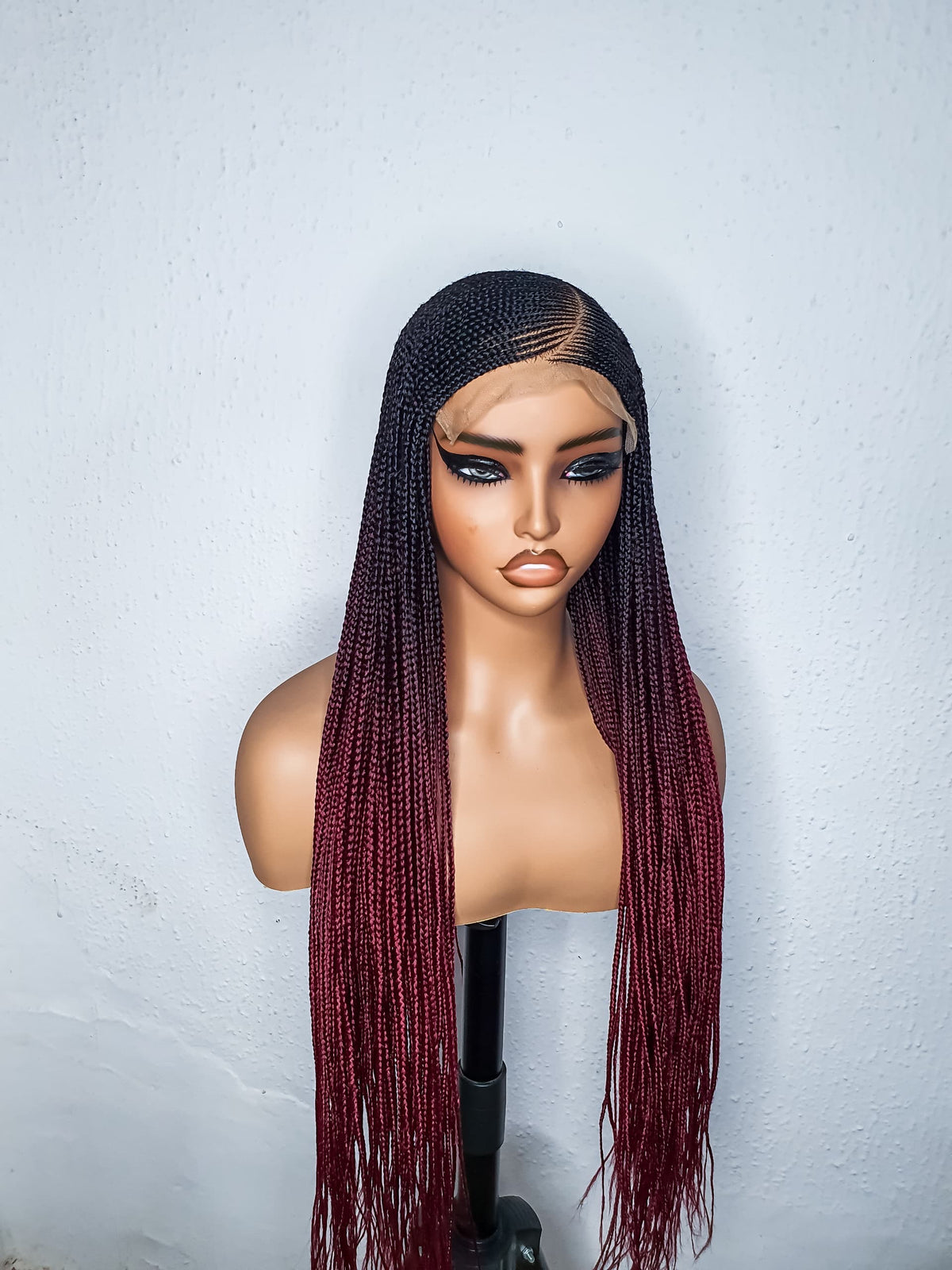 Full front view of 28 inch C-cut cornrow braided wig in color 2 to burgundy ombré
