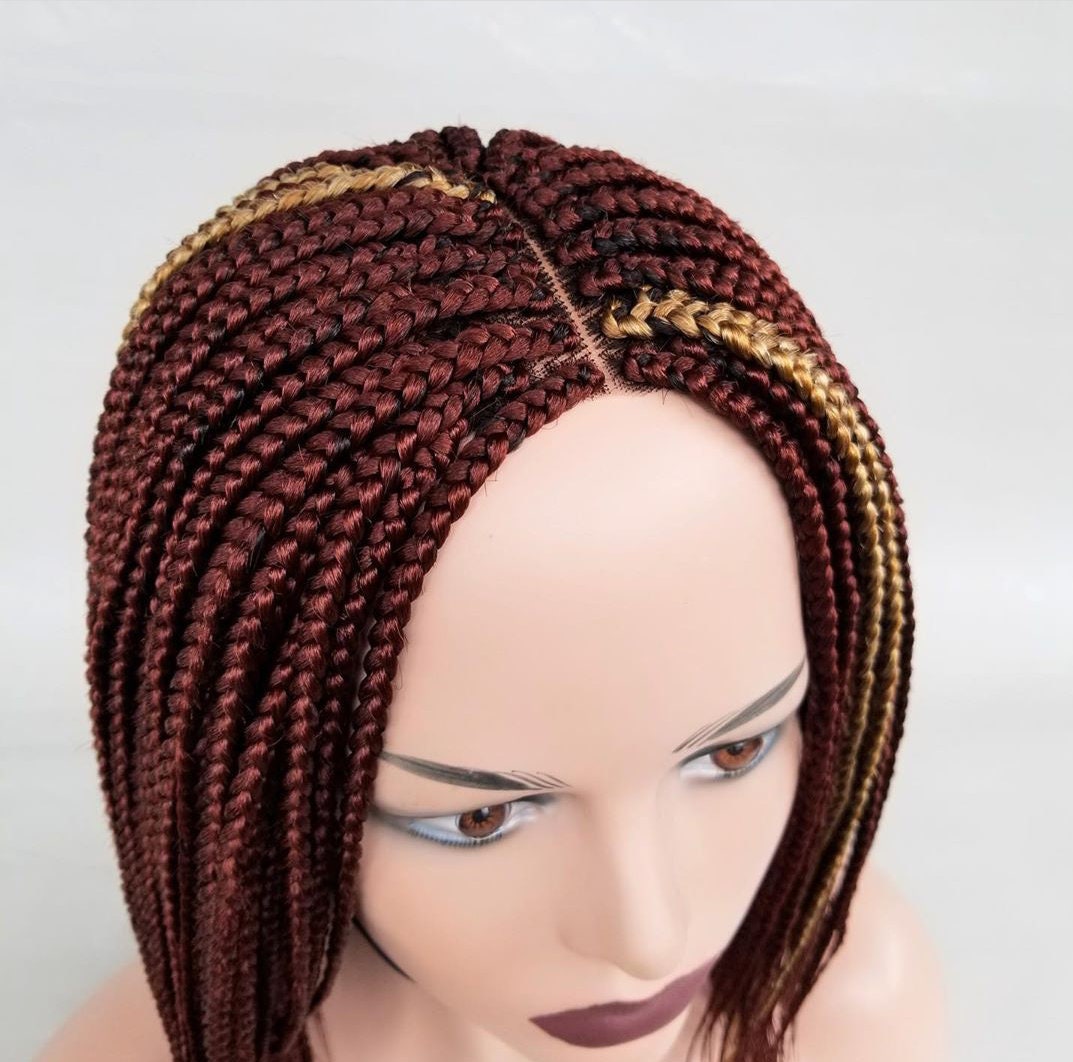 Closer view Short burgundy box braid wig with gold highlights on mannequin head braided wig
