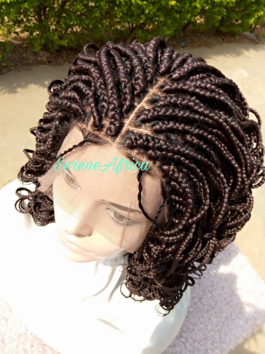Close-up of lace front hairline and curled braid ends