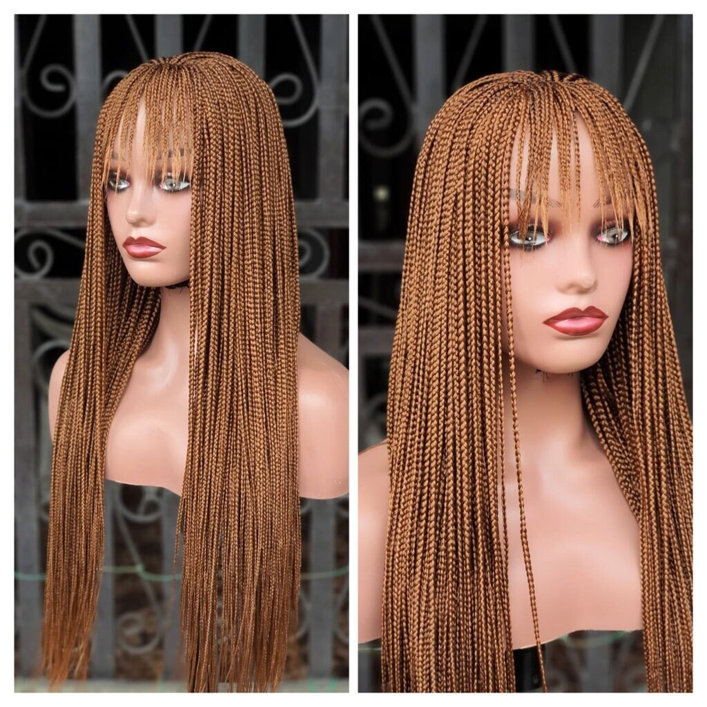 Front view light brown box braid wig with bangs short natural braided wig on mannequin head