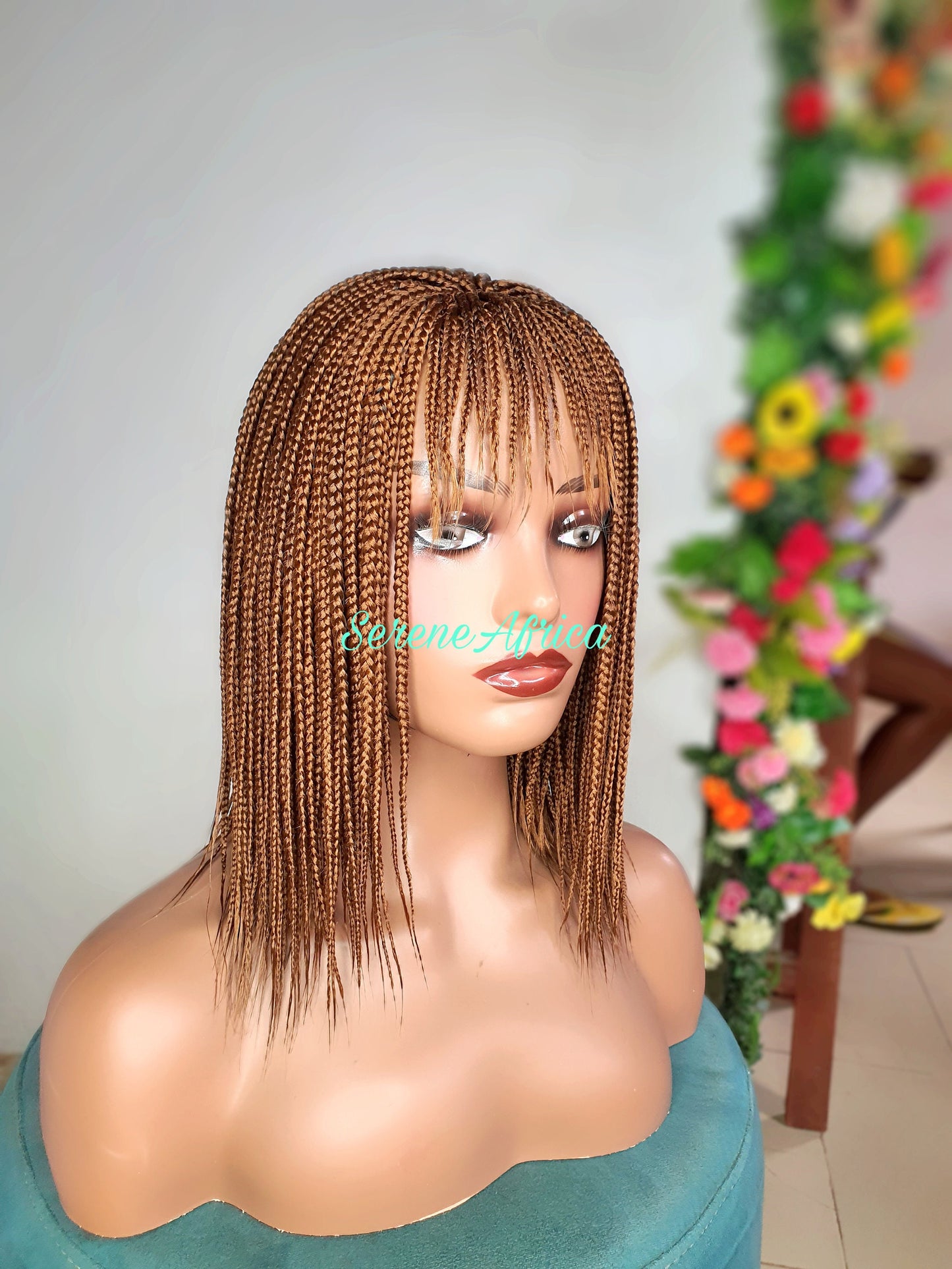 Side view short box braid wig with bangs color 30 on mannequin head ready to wear braided wig
