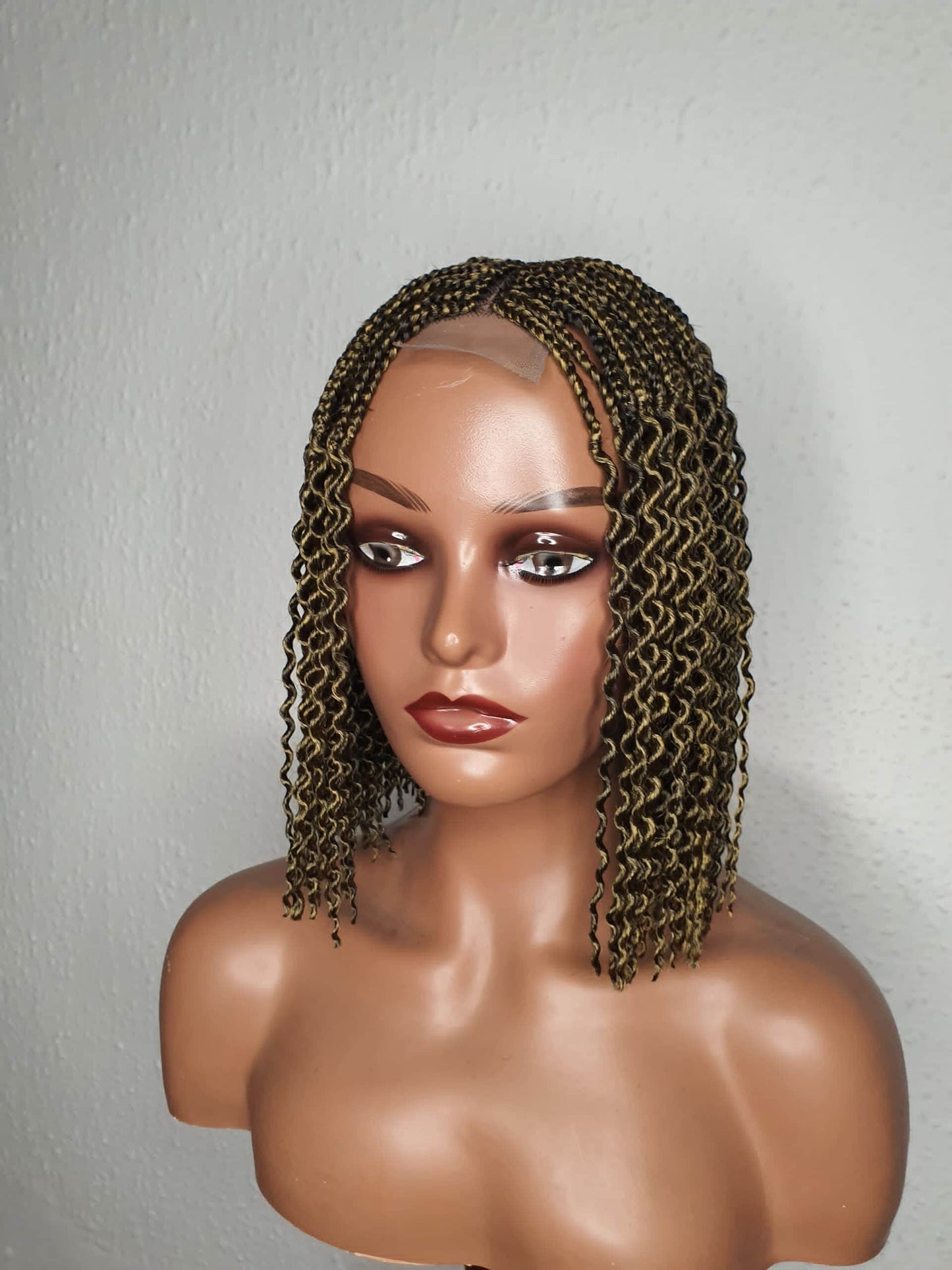 Gold Black box braid wig with highlights on mannequin head braided wig
