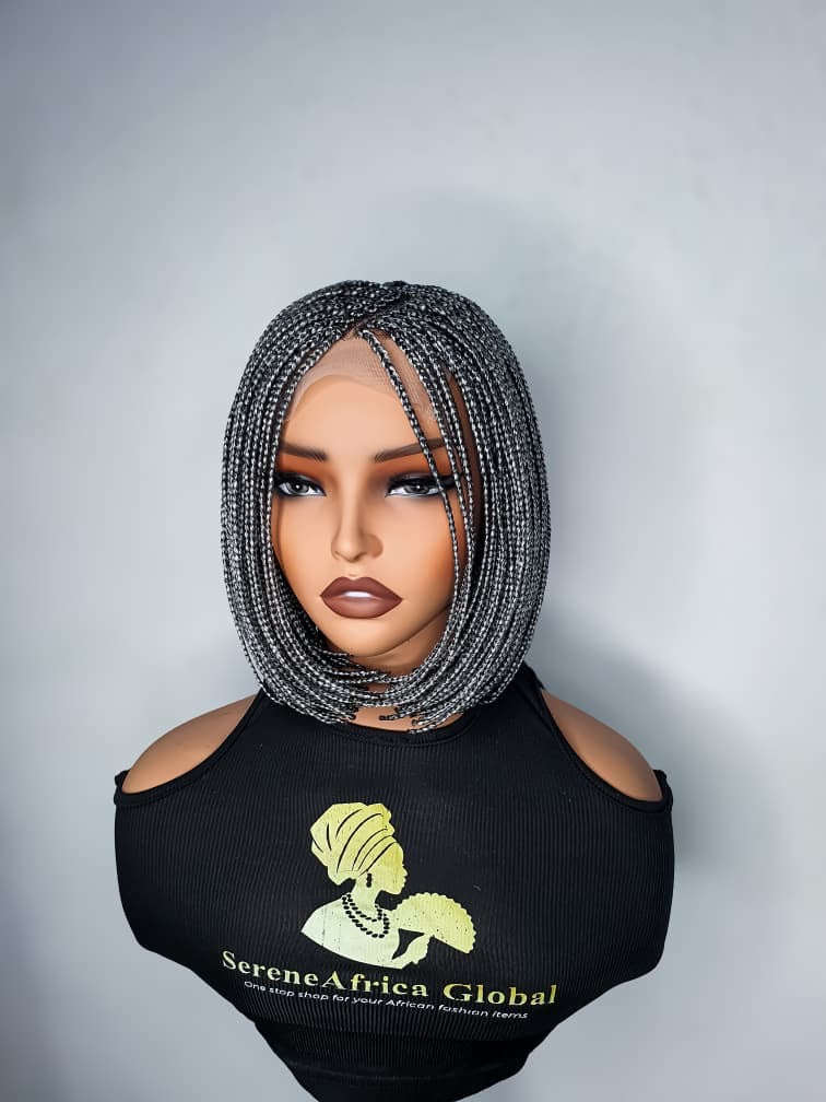 Short colour 2 black bob braided wig with curled ends on mannequin