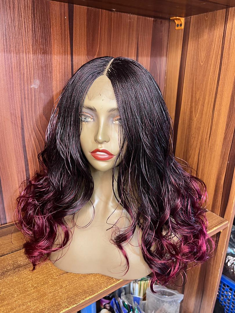 Front view of black burgundy ombre nano twist wig with centre part and curls