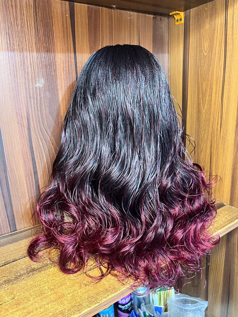 Back view of 22-inch black burgundy ombre nano twist wig with curls
