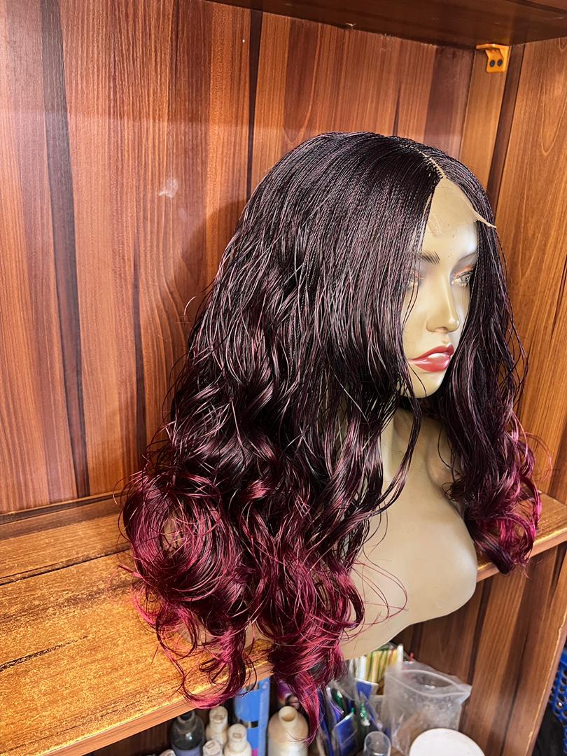 Angled side view of 22-inch black burgundy ombre nano twist curly wig