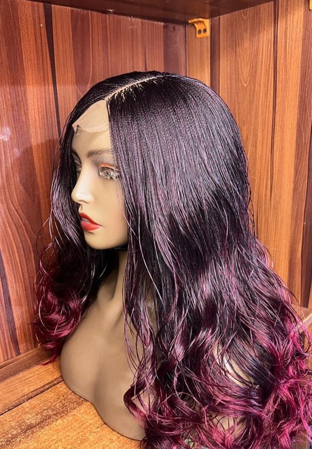 Side view of nano twist braid wig with black roots and burgundy curled ends