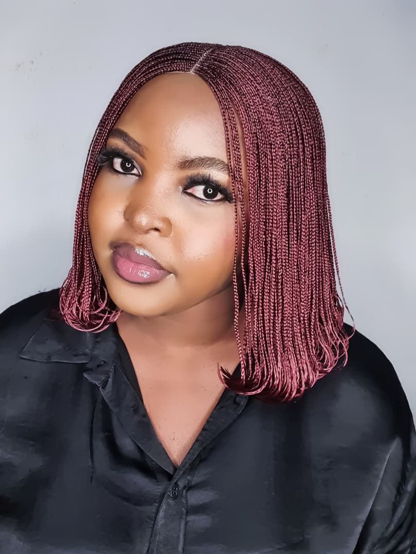 Burgundy small-braid bob wig with centre part, angled front view