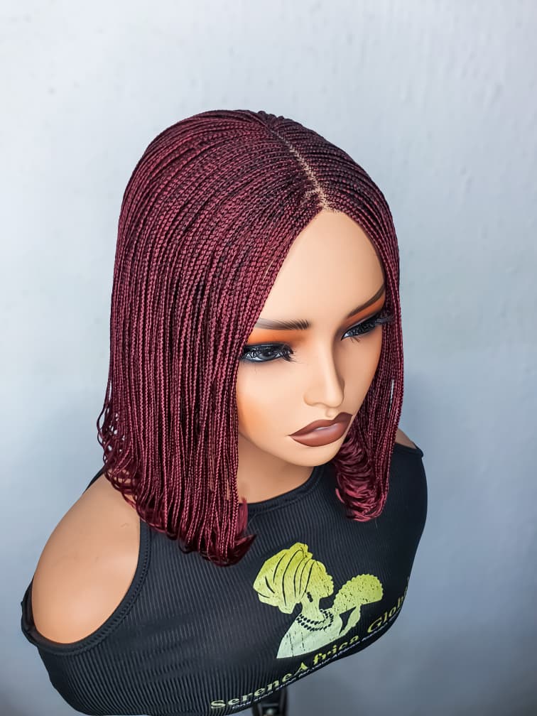 Angled top view of ready-to-ship burgundy small-braid bob wig