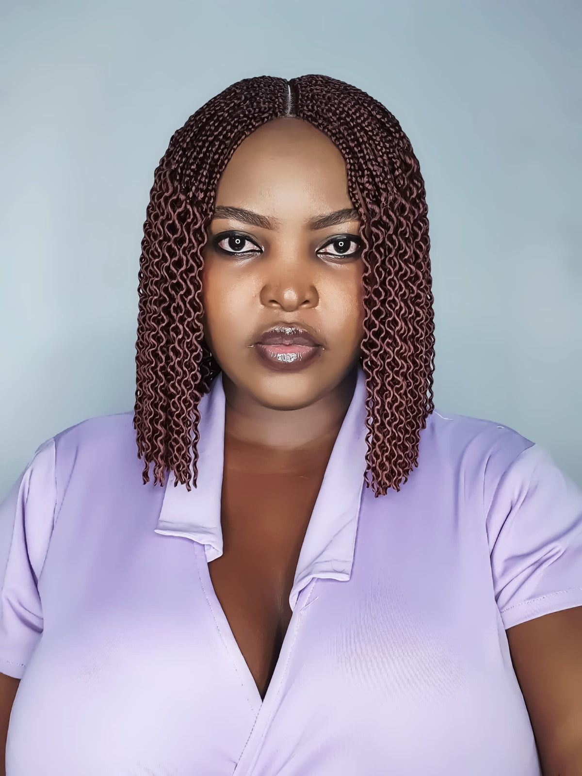 Front view of colour 35 watermelon braid wig with textured ends