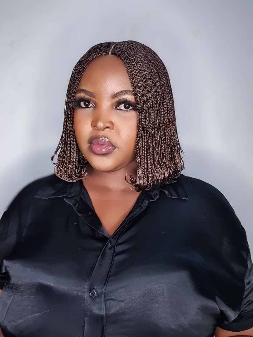 Woman wearing short colour 33 dark brown bob braided wig, angled front view