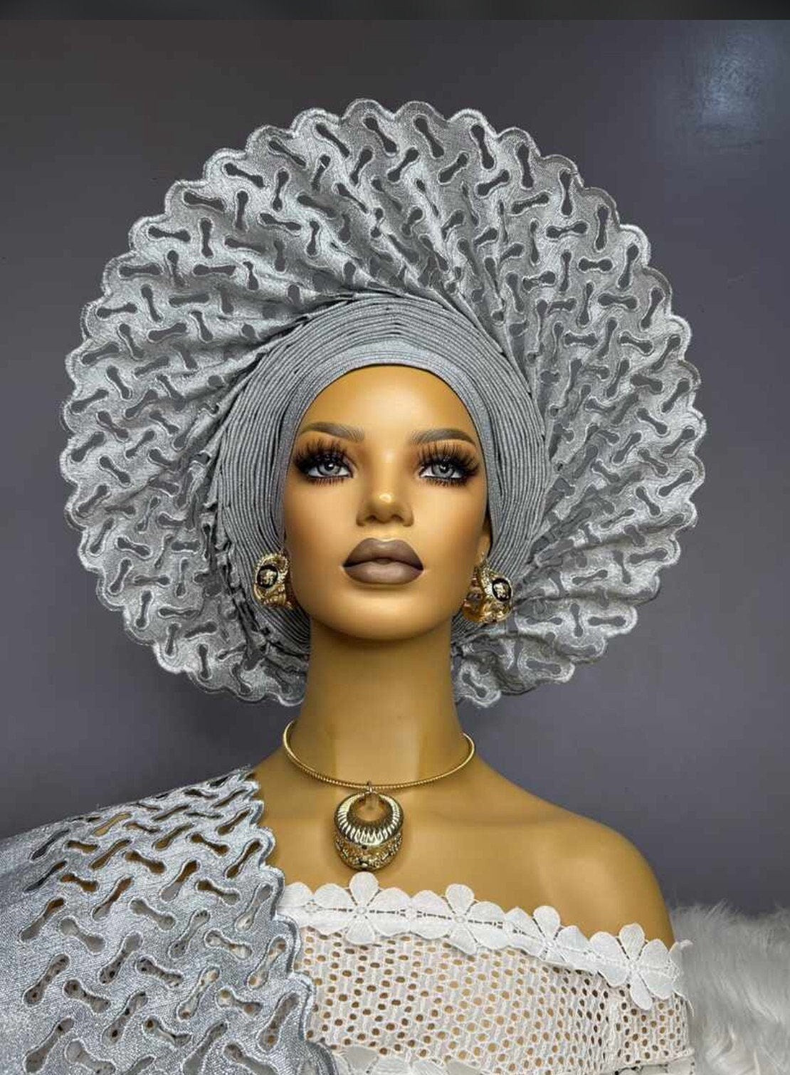 Silver auto gele headwrap in Nigerian aso-oke style for weddings and special occasions 